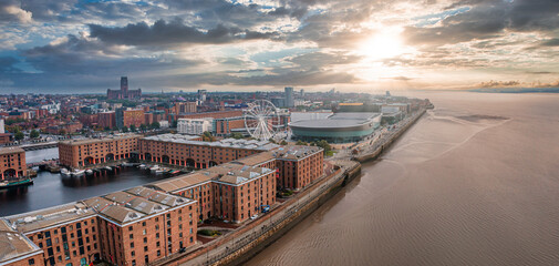 Beautiful panorama of Liverpool waterfront in the evening sunset. Liverpool aerial view.