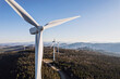 © Cavan Images - wind turbine wind farm on mountaintop Kibby Mountain Maine