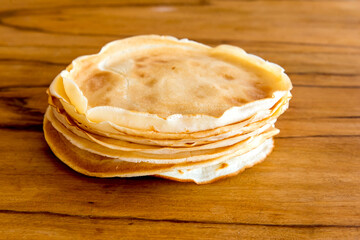 Pancakes, typical Brazilian pancakes on wooden table.