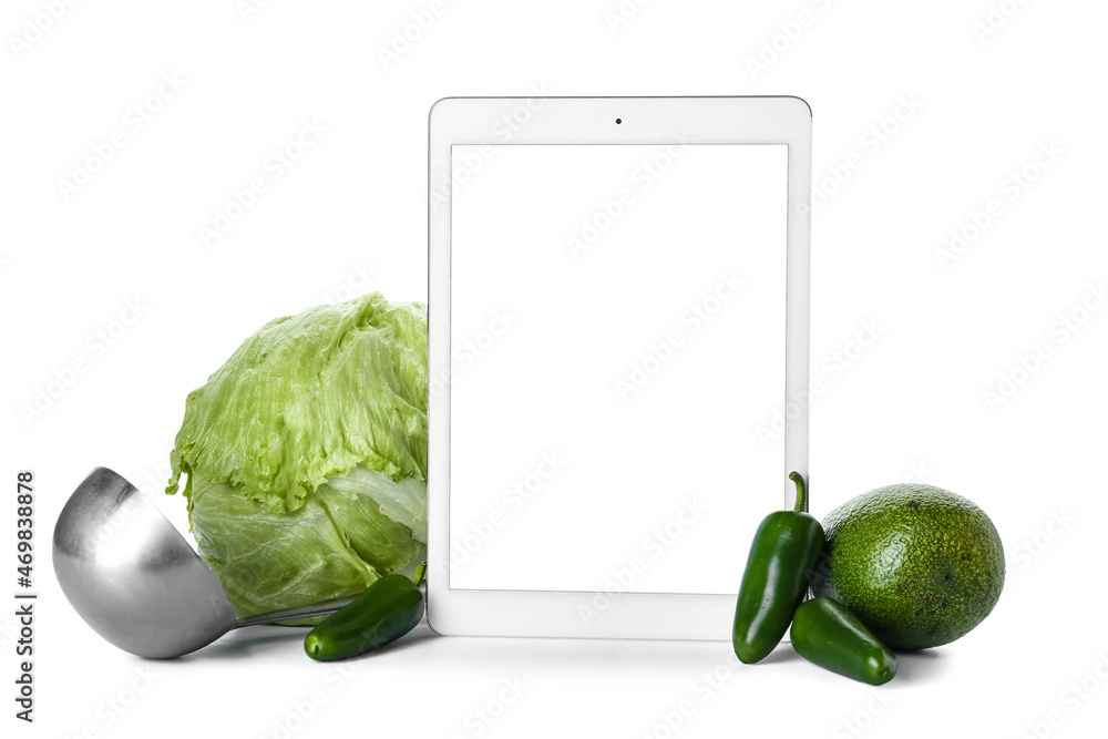 Composition with digital recipe book on white background