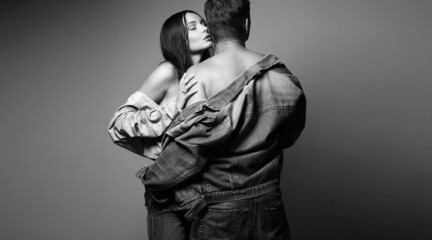 Wall Mural - lovely beautiful couple in jeans. boy and girl together