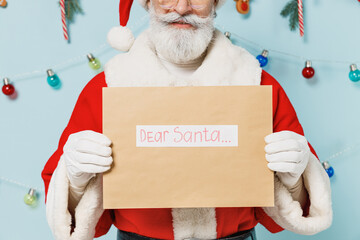 Wall Mural - Cropped old Santa Claus man wears Christmas hat red suit hold letter with dear santa title text isolated on plain blue background studio Happy New Year 2022 celebration merry ho x-mas holiday concept