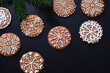 © Johnér - Christmas cookies with icing on black background