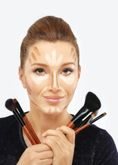 Wall Mural - Contouring.Make up woman face. Contour and highlight makeup.