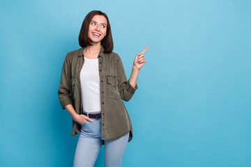 Wall Mural - photo of positive cheerful lady promoter point hand empty space indicate ads isolated over blue colo