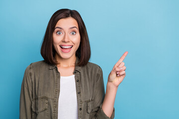 Wall Mural - photo of impressed lady promoter point hand empty space indicate incredible ad wear khaki clothes is