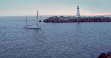 Aerial View Of Yatch Entering Harbour And Lighthouse  In Santa Cruz Harbor
