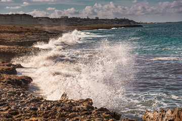 Wall Mural - Sea splashing on rocks