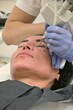 © dreamsnavigator - Laser pseudoblepharoplasty, removal of pigmentation, elimination of skin imperfections, in a beauty salon
