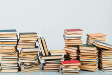 Stacks Of Educational Books In The College Library On A White Background