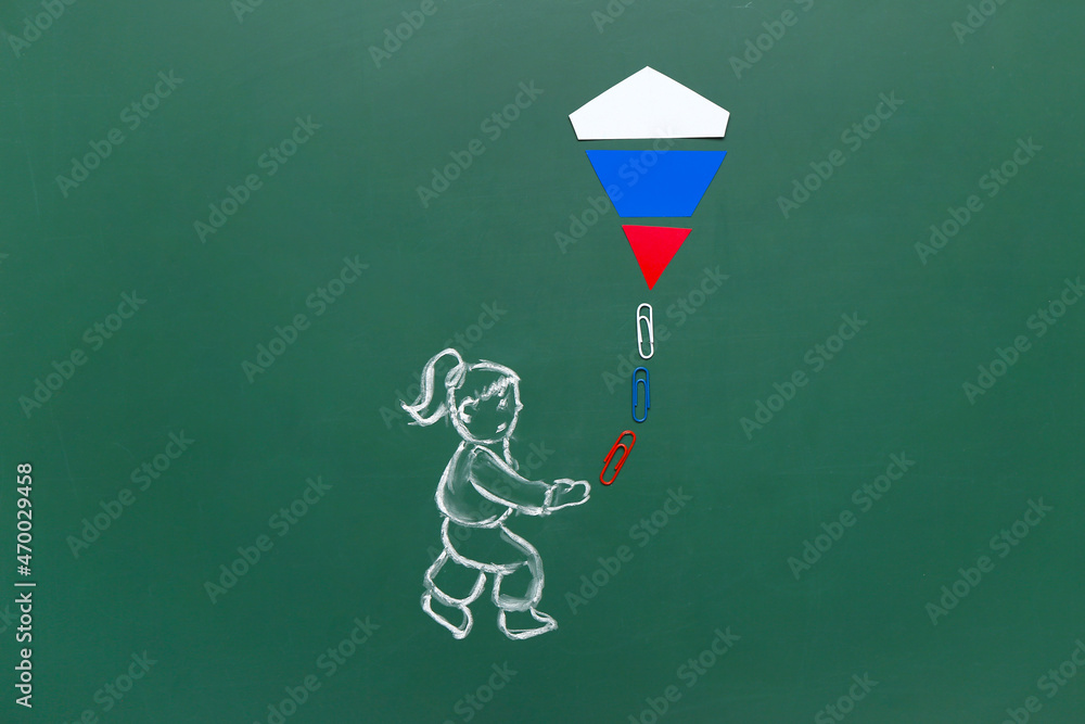Russian flag concept. Drawn girl with kite on blackboard background