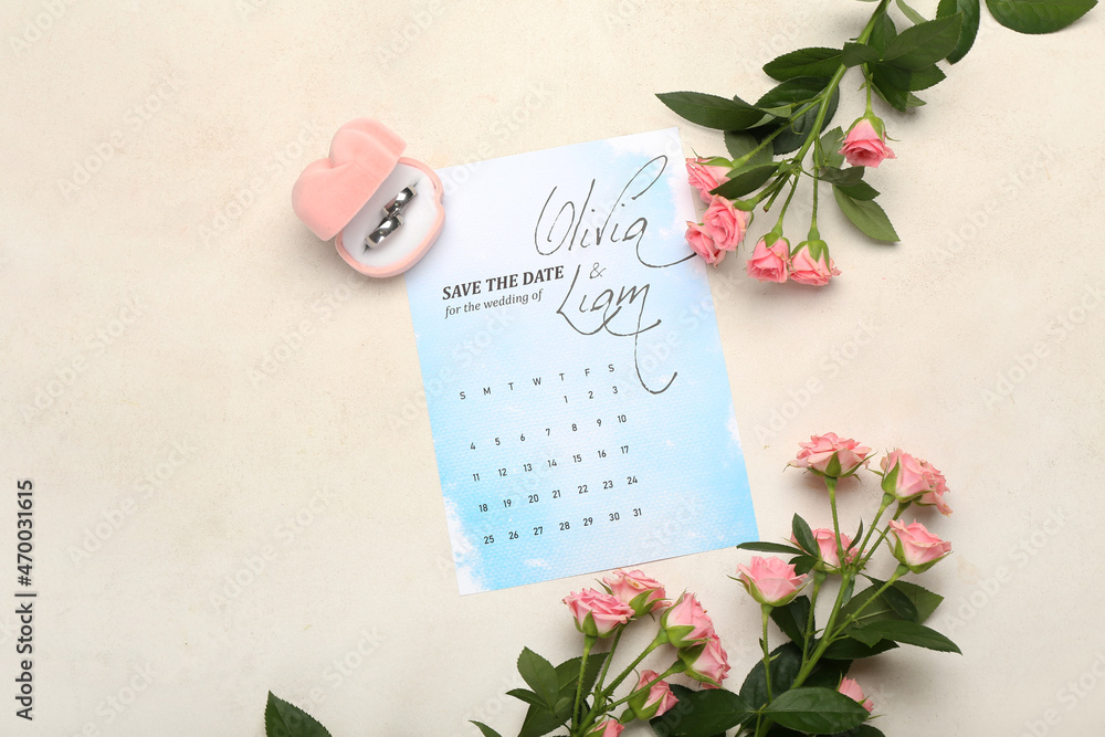 Beautiful composition with wedding calendar on table