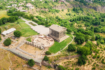 Wall Mural - Drone point of view of the famous Garni temple in Armenia. This historic Greek-style building is located on the edge of a picturesque gorge. Travel and Tourism location