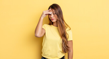 Wall Mural - asian pretty woman feeling stressed, unhappy and frustrated, touching forehead and suffering migraine of severe headache