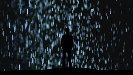Wall Mural - the man in suit standing on a flying shimmering particles background