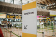 © ADDICTIVE STOCK - Check in signboard in airport