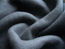 Black Jersey Fabric With Fleece Backing. Non-woven Fabric Texture, Knitted Fabric.