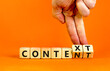 Content and context symbol. Businessman turns wooden cubes and changes the word context to content. Beautiful orange table, orange background. Business and content and context concept. Copy space.