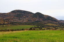 Charlevoix Landscape In Autumn. Field And Mountains In October. Rural And Countryside In Autumn. Autumnal. Travel In Charlevoix In Quebec.
