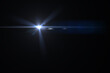 © aekachai - Beautiful optical lens flare effect on black blackground