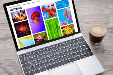 Wall Mural - Laptop computer with nature photography portfolio on the screen