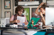 © luckybusiness - caucasian young male and  female working together, having fun. joy at work