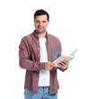 © Pixel-Shot - Young man with book and earphones on white background