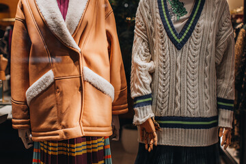 Poster - Mannequins dressed in a stylish fashionable winter collection. Knit Sweater and Brown Fur Coat. Fashion details