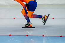 Speed Skater Athlete In Bright Orange Skin Suit