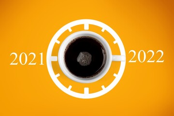 Canvas Print - Happy new year 2022. Cup of coffee change 2021 to 2022 on the background. Start concept