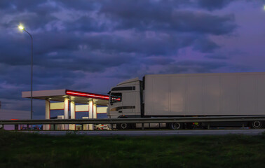 Canvas Print - Truck moves on country highway