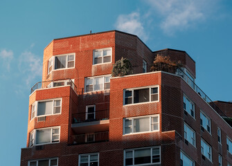 Wall Mural - Modern residential district with high-rise houses in the city at sunset.	
