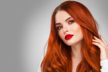 Glamour Woman With Long Red Hair