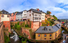 Saarburg, Germany. Cityscape With Leuk River And Old Historic Watermills.
