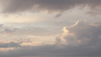 Wall Mural - Sunset or sunrise cloudscape with clouds backlit