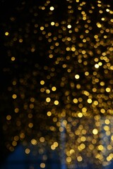 Wall Mural - Golden christmas lights blur background	