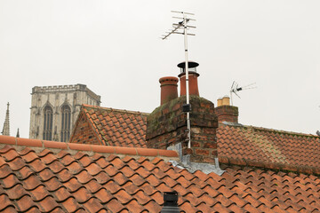 Wall Mural - Roof tiles and chimneys of British terraced houses in York England