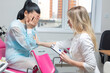 © satyrenko - A gynecologist comforts a crying girl sitting in a gynecological chair after the news of a frozen pregnancy. Pregnancy loss, sexually transmitted infections, psychological support, medical ethics