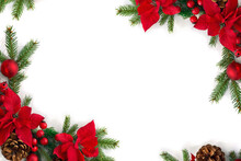 Christmas Decoration. Frame Of Flowers Of Red Poinsettia, Branch Christmas Tree, Red Berries And Cones On White Background With Space For Text. Top View, Flat Lay