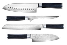 A set of professional Japanese kitchen knives from the finest steel on a white isolated background. A set of knives from a restaurant chef. The best tools for the kitchen and food preparation.