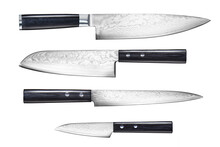 A Set Of Professional Japanese Kitchen Knives From The Finest Steel On A White Isolated Background. A Set Of Knives From A Restaurant Chef. The Best Tools For The Kitchen And Food Preparation.