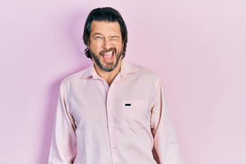 Poster - Middle age caucasian man wearing casual clothes winking looking at the camera with sexy expression, cheerful and happy face.