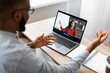 © Prostock-studio - Millennial african american guy student studying with teacher remote, learning english language with lesson class