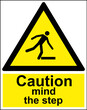 Caution mind the step yellow warning sign