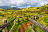 Fototapeta  - Pieszy szlak po polach siarkowych, zabezpieczony drewnianym ogrodzeniem Furnas De Enxofre, Terceira, Azores, Portugalia