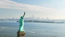 Drone View Statue Of Liberty NYC, Aerial Manhattan Downtown New York City. Travel Destination And Popular Tourist City In America. Historic Liberty Island. Tourist Landmark In USA. 