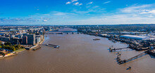 Aerial View Of The London City Dam Or Thames Flood Barrier Over River Thames.