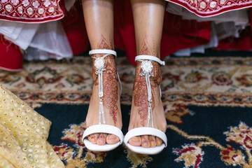 Indian bride's wedding shoes close up