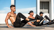 © Atstock Productions - Group of athletic men doing bicycle crunch workout exercise outdoors on rooftop floor