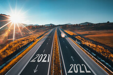 Driving On Open Road At Beautiful Sunny Day To New Year 2022. Aerial View